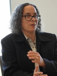 Photo of Maria in legislative meeting