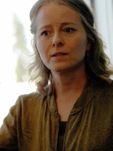 An image of Jess speaking in a legislative meeting